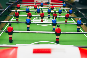 Board game football close up. Two soccer teams. The concept of entertainment in free time.
