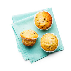 Sweet vanilla muffins isolated on white background.