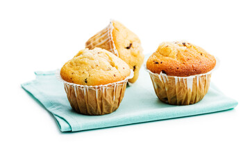 Sweet vanilla muffins isolated on white background.