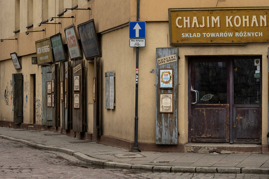 Hstoric jewish district of Crakow - Kazimierz. Szeroka street with historic shop windows.