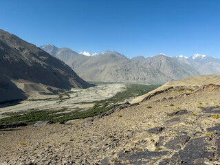 The dry river bed as a border line to Afghanistan.