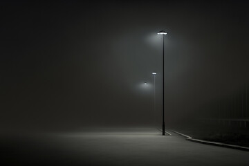 Obraz na płótnie Canvas Streetlight on a foggy and dark parking lot