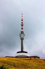 Obraz premium A TV transmitter on the top of the Praded mountain, the highest peak of the Jeseni­ky mountains, Czech Republic, Europe. Cloudy day in the mountains.