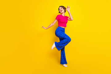 Full length photo of cheerful active energetic positive lady celebrate cool proposition empty space...