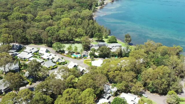 Resort travel holiday village Murrays beach on Macquarie lake in Australia 4k.
