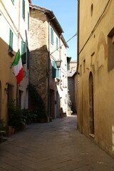 Narrow old alley in Pienza, Tuscany Italy
