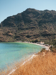 Turquoise water beach with Rv in Bahía Concepción,  Loreto, Baja California, Mexico