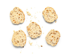 Slices of delicious baguette isolated on white background