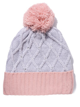 Gray-pink knitted hat with a pom-pom on a white isolated background