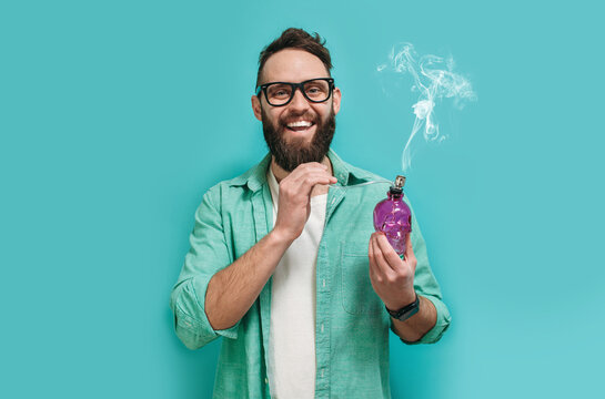 Hipster guy smokes marijuana with bong
