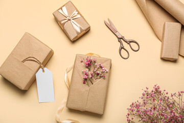 Composition with gift boxes, greeting card and gypsophila flowers for Women's Day celebration on...
