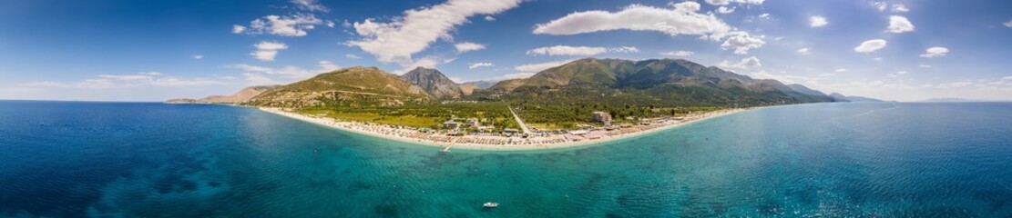 Large panorama of 7 km long beach in village Borsh, Albania in Summer 2022