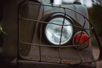 Vintage green car headlight and turn signal