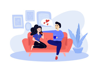 Couple, friends sitting and talking on the red sofa and drinking tea or coffee. Relationship and conversation.