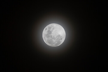 The halo of the full moon.