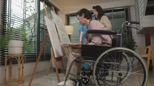 Group of Asian old women in nursing home Concentrate happy paint canva