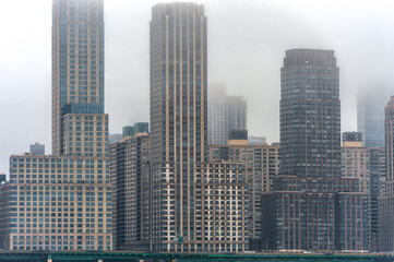 Fototapeta na wymiar Misty New York Cityscape in Background. NYC, USA.