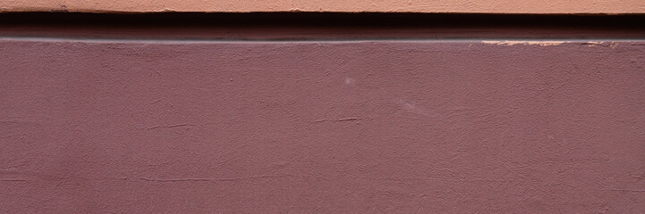 Fototapeta premium Decorative elements on the wall. Rough painted surface. Empty place for text, images and ads. Wide panoramic texture for background and design.