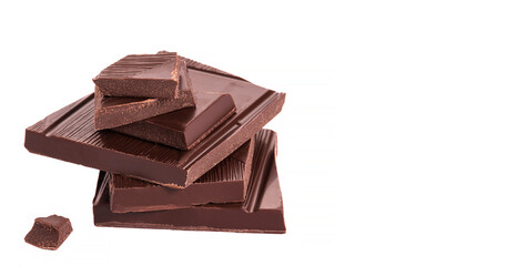 Close up pieces of chocolate on a white background, dessert isolated, cafe concept.