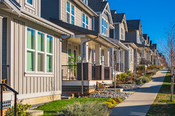 Modern residential houses neighborhood street in a suburban residential area. New and comfortable neighborhood