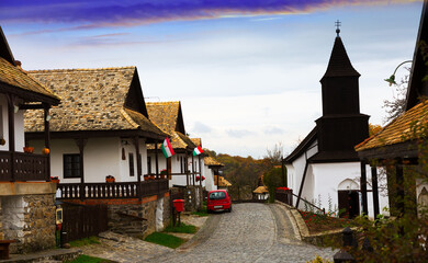 Fototapeta na wymiar Rural landscape of tourist hungarian village Holloko with old wooden church