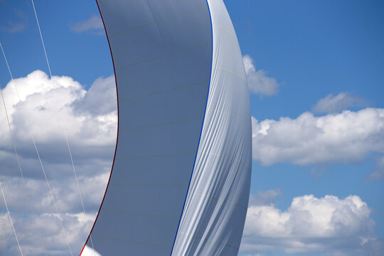 Sail detail and spinnaker of classic racing yacht