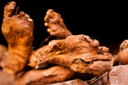 Feet of the devout emerge from the crypts of Bet Giyorgis, Lalibela, Northern Ethiopia.