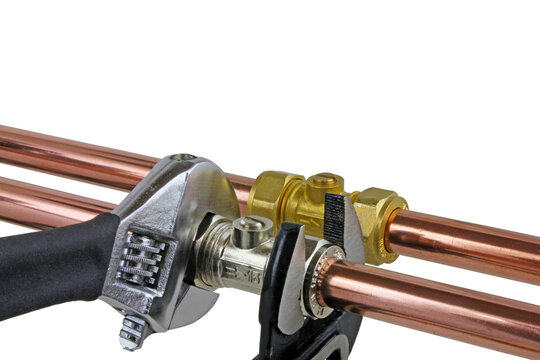 Wrenches adjusting isolating valve.