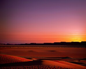 wadi, iran-november: sand national sands desert. sunset with a red stripes.