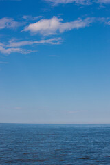 Seascape with horizon over water taken from Gaspésie showing the wide part of the Saint Lawrence River.
