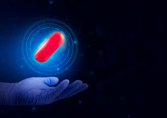 Diet. Nutrition. Healthy eating, lifestyle. Vitamin D, E, A in capsule. Prescription medical concept. Pharmacist. Red pill with hand and technology digital blue background