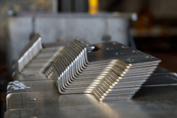 The finished product after bending on a sheet metal bending machine. Bending of various products at...