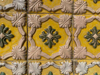 Old wall cladding in ceramic tile typical of buildings in the city of Porto in Portugal.