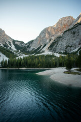 A different and beautiful view of the famous Lago di Braies, at sunrise, in Dolomites, Italy
