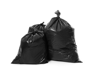 Trash bags full of garbage isolated on white