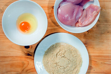 Raw ingredients. Ready to be cooked. Recipe for chicken stew, European cuisine, cooked with a garnish of mushrooms, small onions and other.