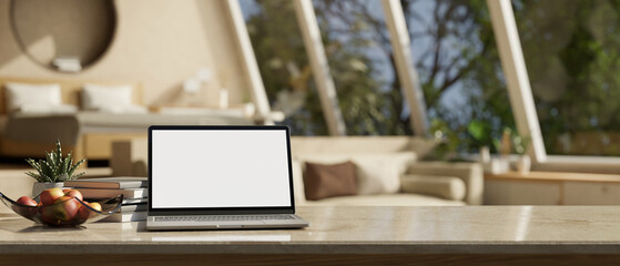 close-up image of a modern workspace in comfortable bedroom, laptop mockup, decor on tabletop