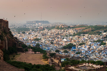 Beautiful top view of Jodhpur city from Mehrangarh fort, Rajasthan, India. Jodhpur is called Blue city since Hindu Brahmis there worship Lord Shiva, whose colour is blue, they painted houses in blue.