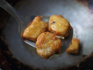 frying nugget on dirty pan