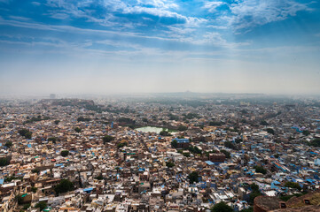 Fototapeta na wymiar Beautiful top view of Jodhpur city from Mehrangarh fort, Rajasthan, India. Jodhpur is called Blue city since Hindu Brahmis there worship Lord Shiva, whose colour is blue, they painted houses in blue.