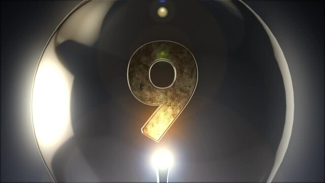 電球のようなガラス球の中に入った金属質感の回転する3d10から0の数字のループ素材