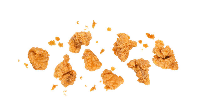 Fried popcorn chicken with crumbs isolated on transparent background. PNG
