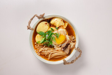 Sundubu JJigae is Korean Spicy Soft Tofu Stew.