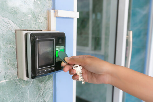Proximity card reader door unlock, using ID card on fingerprint scanning access control system for identity verification to open the door.