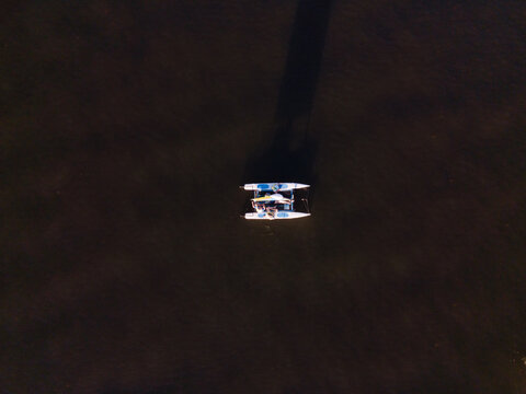 Sailing Dinghy / Boat From Above On Dark Water - Western Australia 