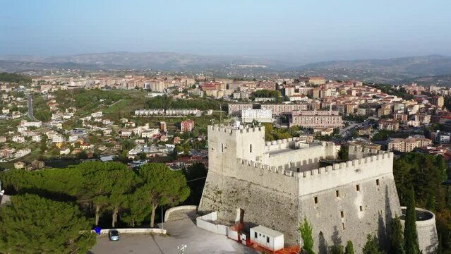 Reveal shot of Campobasso city in Molise region, flying over Monforte Castle