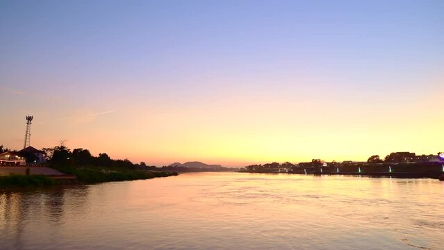 4K timelapse video of origin of the Chao Phraya River during sunset in Nakhon Sawan Province.