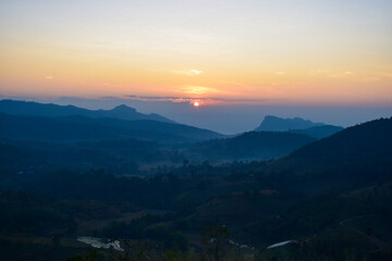 Scenery top view of the mountains in an early morning in Tambon Ban Pae, Chiang Mai, Thailand. December 2022.