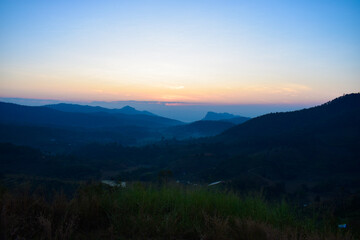 Plakat Scenery top view of the mountains in an early morning in Tambon Ban Pae, Chiang Mai, Thailand. December 2022.