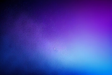rain drops on glass with blue and purple gradient background, copy space